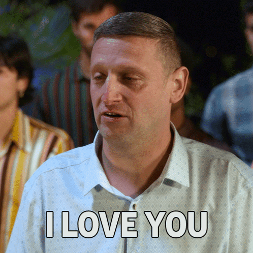 A Man Says " I Love You " In Front Of A Crowd GIF