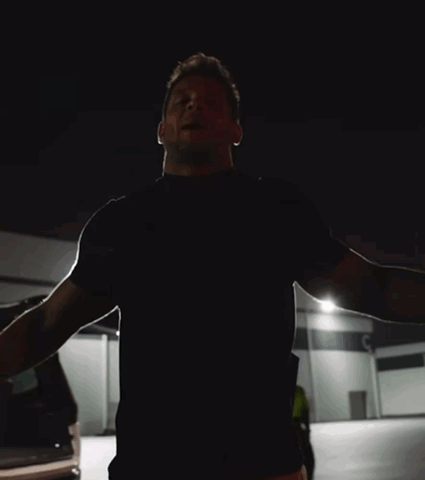 A Man Says I 'M Back Baby In A Dark Room GIF