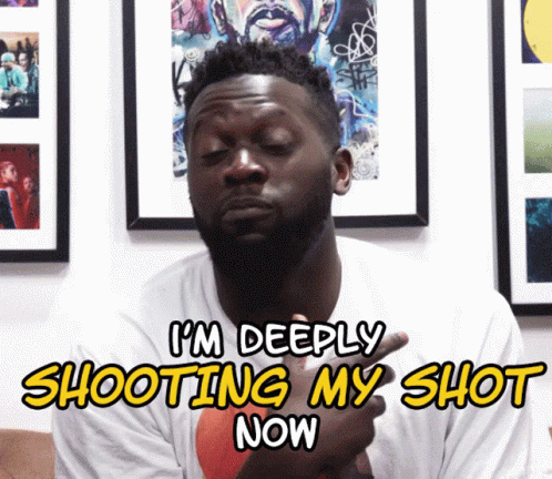 A Man Says I 'M Deeply Shooting My Shot Now In Front Of Framed Pictures GIF