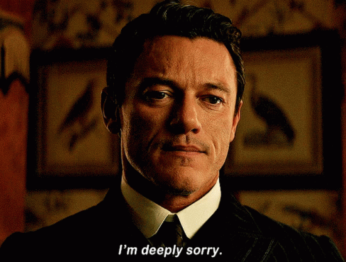 A Man Says I 'M Deeply Sorry In A Dark Room GIF