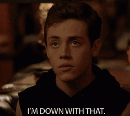 A Man Says I 'M Down With That In A Dark Room GIF