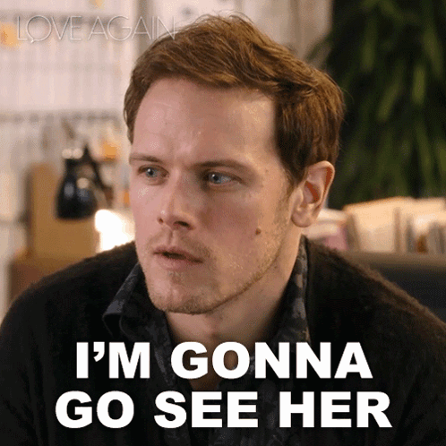 A Man Says " I 'M Gonna Go See Her " While Wearing A Black Shirt GIF