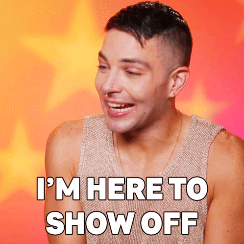 A Man Says I 'M Here To Show Off In Front Of A Flaming Background GIF