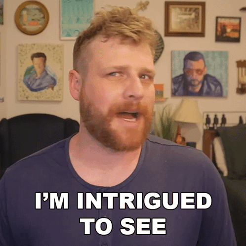 A Man Says I 'M Intrigued To See In Front Of Paintings GIF