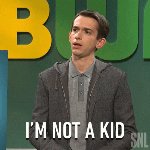 A Man Says I 'M Not A Kid In Front Of A Green Background GIF