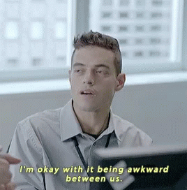 A Man Says I 'M Okay With It Being Awkward Between Us While Looking At A Laptop GIF