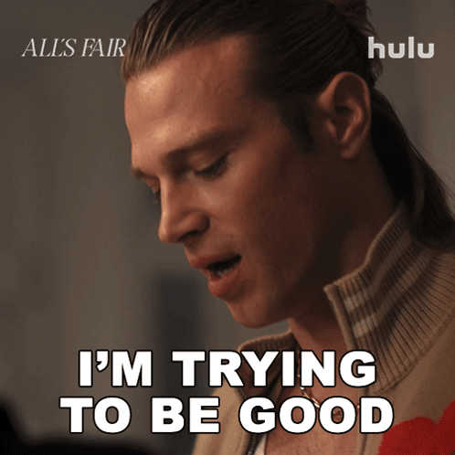A Man Says " I 'M Trying To Be Good " In Front Of A Hulu Logo GIF