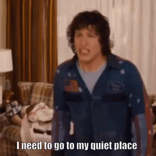a man says i need to go to my quiet place while standing in front of a couch