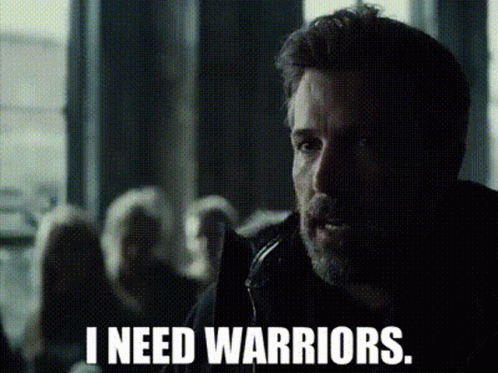 A Man Says I Need Warriors In Front Of A Crowd GIF