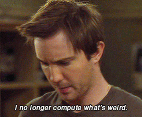 A Man Says " I No Longer Compute What 'S Weird " In A Dark Room GIF