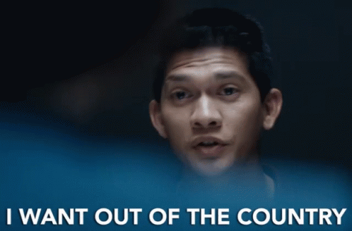 a man says " i want out of the country " in front of a dark background