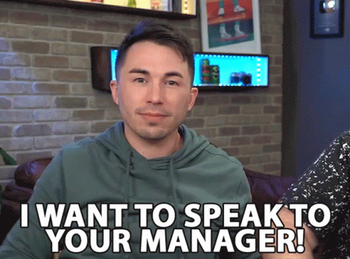 A Man Says " I Want To Speak To Your Manager " In Front Of A Brick Wall GIF