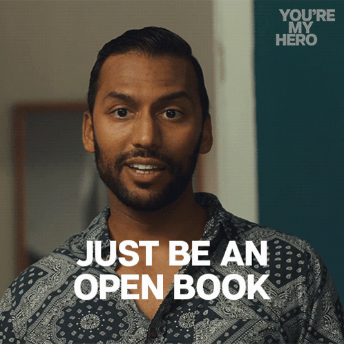 A Man Says " Just Be An Open Book " In A You 'Re My Hero Advertisement GIF