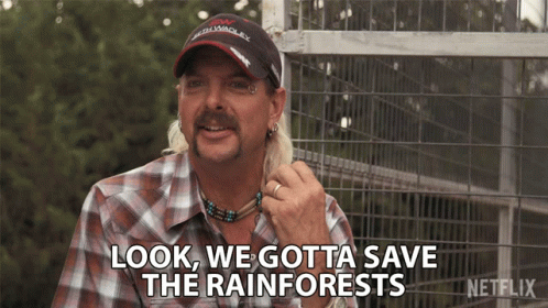 A Man Says Look We Gotta Save The Rainforests In Front Of A Fence GIF