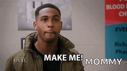 A Man Says Make Me Mommy In Front Of A Sign That Says Blood GIF
