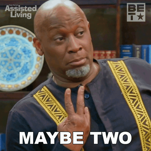 A Man Says Maybe Two In Front Of An Assisted Living Poster GIF