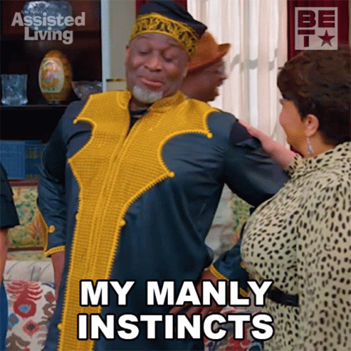 A Man Says My Manly Instincts While A Woman Looks On GIF