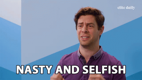 A Man Says " Nasty And Selfish " In Front Of A Blue Wall GIF