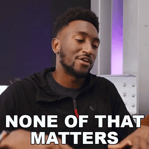 A Man Says " None Of That Matters " In A Purple Room GIF
