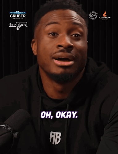 A Man Says Oh Okay In Front Of A Gruber Advertisement GIF