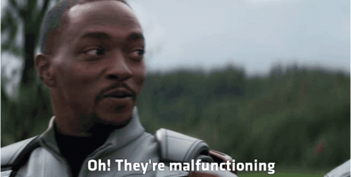 A Man Says Oh They 'Re Malfunctioning In Front Of Trees GIF