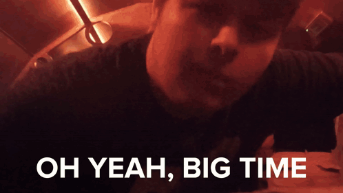 A Man Says " Oh Yeah Big Time " In A Red Background GIF