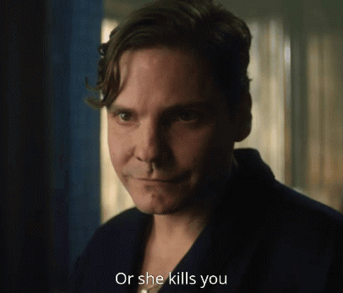 A Man Says " Or She Kills You " In Front Of A Window GIF