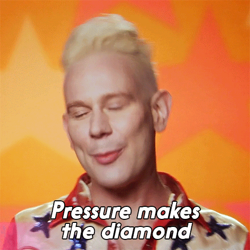 A Man Says Pressure Makes The Diamond While Wearing A Red White And Blue Shirt GIF