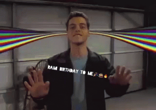 A Man Says Ram Birthday To Me With A Rainbow In The Background GIF