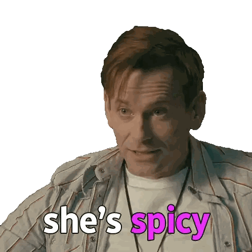 a man says she 's spicy while wearing a lanyard around his neck