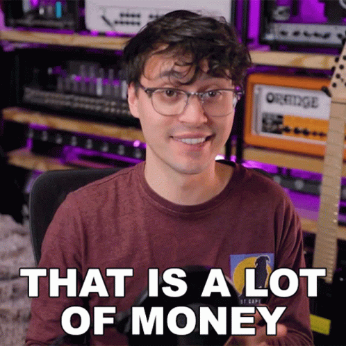 A Man Says That Is A Lot Of Money In Front Of A Guitar GIF