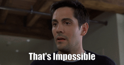 A Man Says That 'S Impossible In Front Of A Wooden Ceiling . GIF
