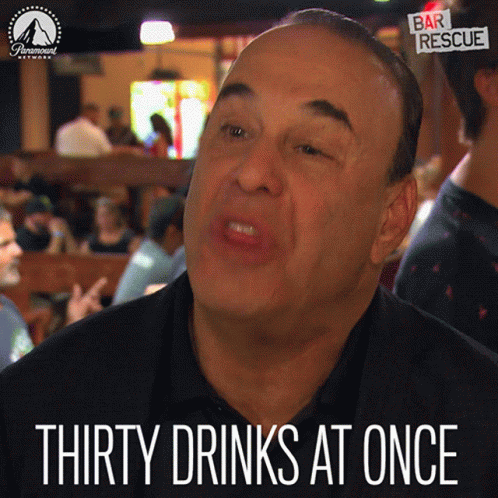 Man Saying Thirty Drinks At Once In Bar GIF