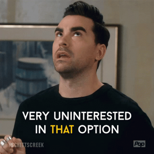 A Man Says Very Uninterested In That Option In Front Of A Framed Picture GIF