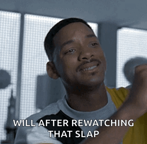 A Man Says " Will After Rewatching That Slap " In Front Of A Window GIF
