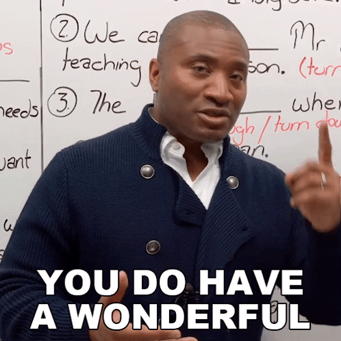 A Man Says You Do Have A Wonderful In Front Of A Whiteboard GIF