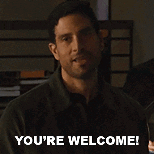 A Man Says " You 'Re Welcome " While Smiling And Looking At The Camera GIF