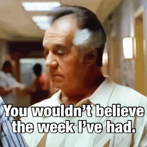 A Man Says " You Wouldn 'T Believe The Week I 'Ve Had " In A Hallway GIF