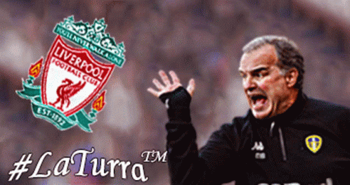 A Man Shouting In Front Of A Liverpool Football Club Crest GIF