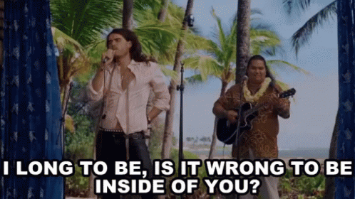 A Man Singing Into A Microphone Next To A Man Playing A Guitar With The Words I Long To Be Is It Wrong GIF