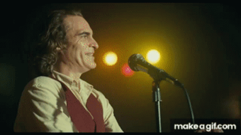 Man Singing Into Microphone GIF