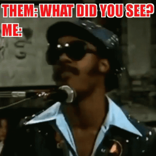 A Man Singing Into A Microphone With The Caption " Them What Did You See " GIF