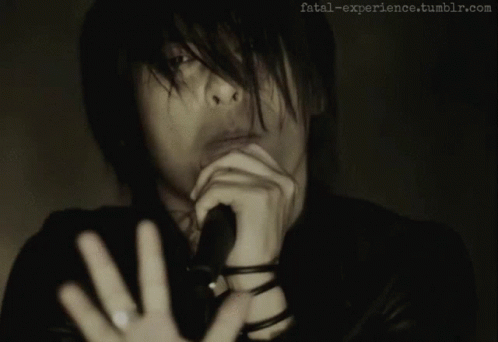 Man Singing Into Microphone GIF
