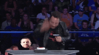 A Man Singing Into A Microphone With The Word Yee On The Bottom Right GIF