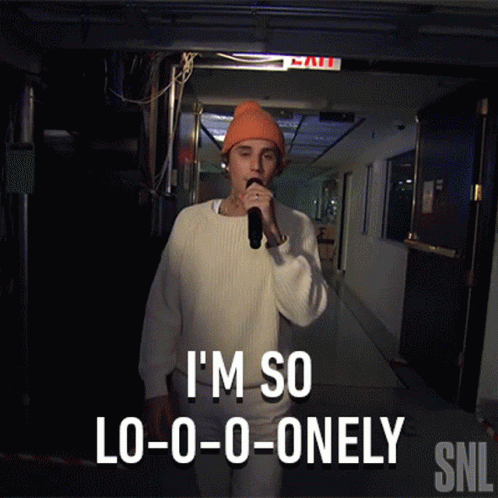 A Man Singing Into A Microphone With The Words I 'M So Lo-O-O-Onely Snl Below Him GIF