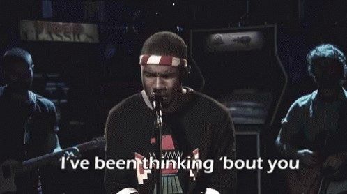 A Man Singing Into A Microphone With The Words I 'Ve Been Thinking Bout You Above Him GIF