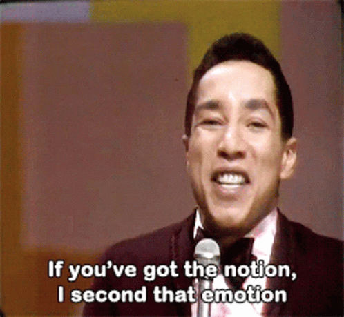 A Man Singing Into A Microphone With The Words " If You 'Ve Got The Notion I Second That Emotion " GIF