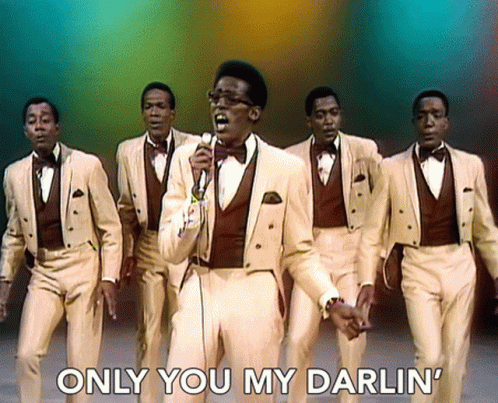 A Man Singing Into A Microphone With The Words " Only You My Darlin " Below Him GIF