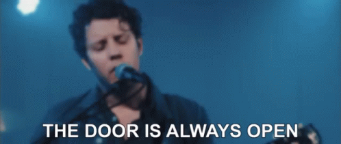 Man Singing Into Microphone The Door Is Always Open GIF