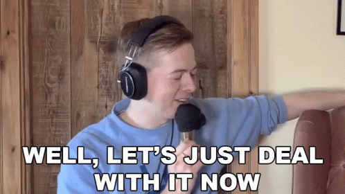 A Man Singing Into A Microphone With The Words Well Let 'S Just Deal With It Now GIF